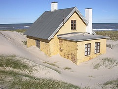 Beach House buried in sand